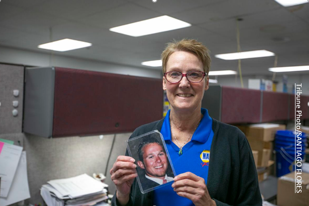 Debie Switalski is alive because of the liver transplant she received. She carries a picture of Zachary, the man whose choice to be a donor saved her life.